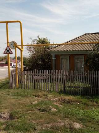 Земельный участок с домом в центре села Кошки