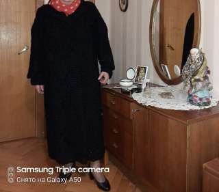 Каракулевая шуба черного цвета