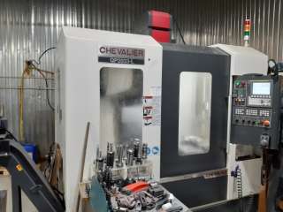 Вертикально фрезерный станок с ЧПУ Fanuc QP2033-L