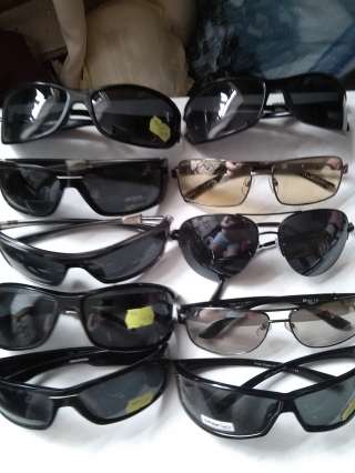 Солнцезащитные очки женские, мужские и детские. Дешевая.