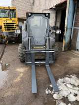Мини-погрузчик ковшовый BOBCAT NEW HOLLAND L225 bobcat