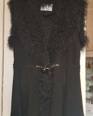 Женская безрукавка из натурального меха