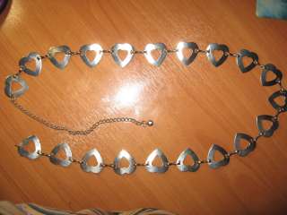 Металлический пояс и серьги