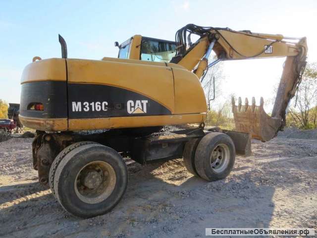 Колесный экскаватор CAT 316, линии, два ковша