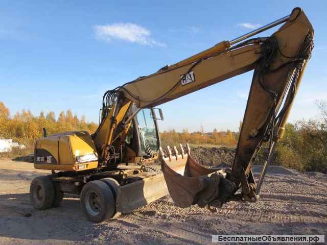 Колесный экскаватор CAT 316, линии, два ковша