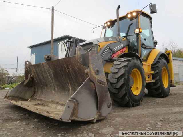 Экскаватор-погрузчик Volvo 71, 2014 г., 9730 м/ч.