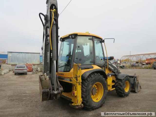 Экскаватор-погрузчик Volvo 71, 2014 г., 9730 м/ч.