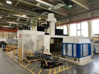 Портальный пятиосевой обрабатывающий центр Huron KX 100