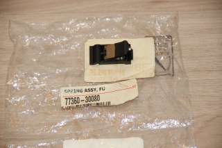 Toyota. Пружинка лючка бензобака 77360-30080