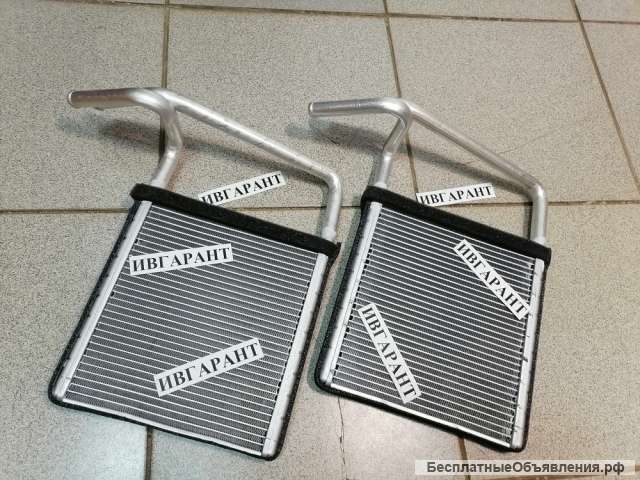 245-7833, 2457833 Радиатор отопителя печки СAT - 245-7833, 2457833