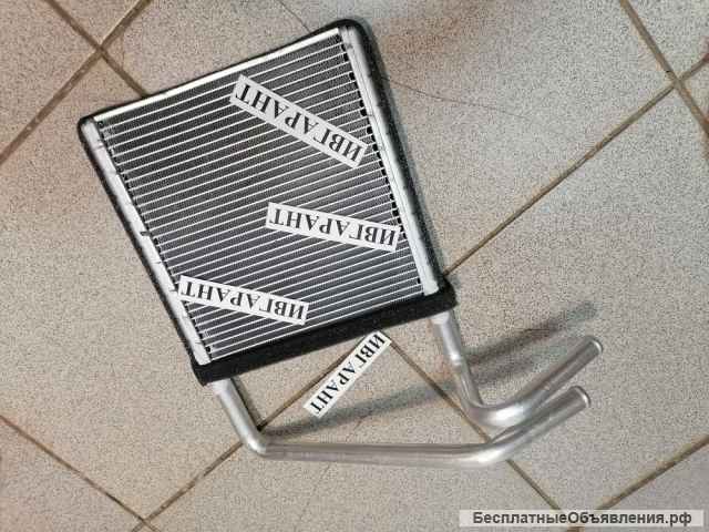 245-7833, 2457833 Радиатор отопителя печки СAT - 245-7833, 2457833