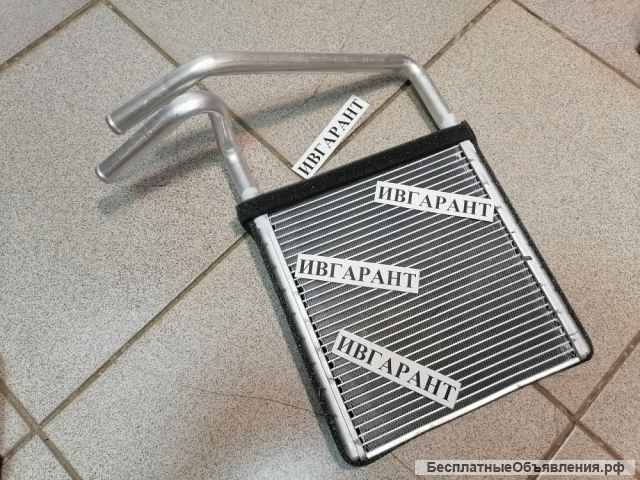 245-7833, 2457833 Радиатор отопителя печки СAT - 245-7833, 2457833