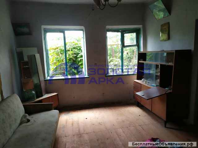 Земельный участок с домом под перестройку