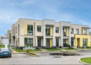 Квартиру в таунхаусе