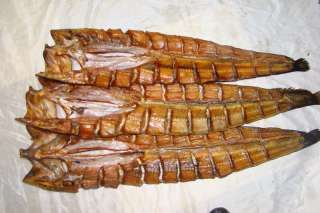 Сом-рыба холодного копчения. вяленная и свежая рыба