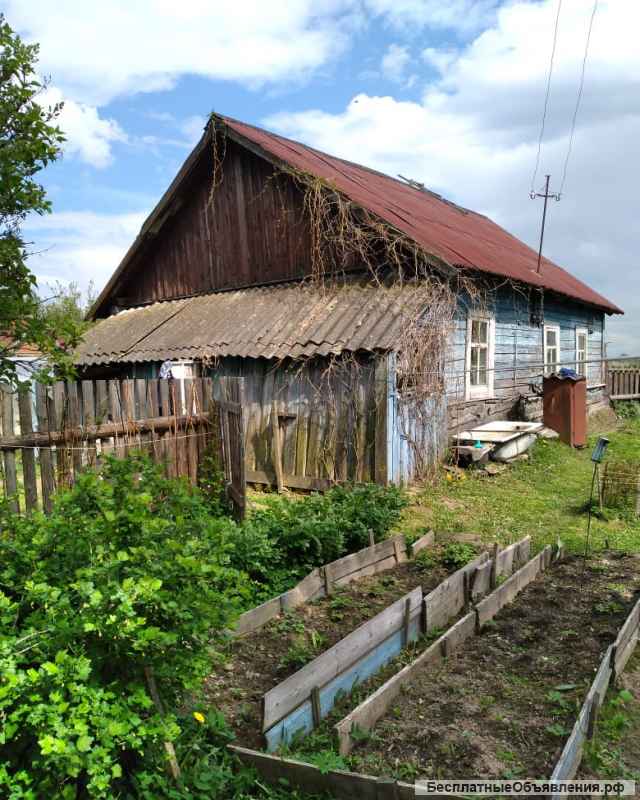 Дом с земельным участком