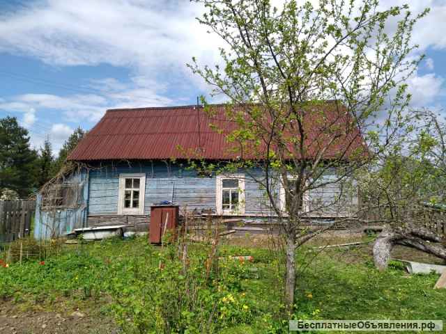 Дом с земельным участком