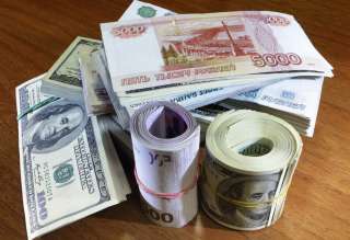 Обмен наличных долларов и евро на рубли