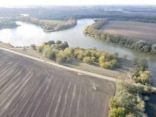 Земельный участок 5 соток, с. Красносельское, ул. Замышевского с выходом в реку.