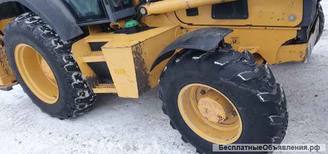 Экскаватор-погрузчик John Deere 325K