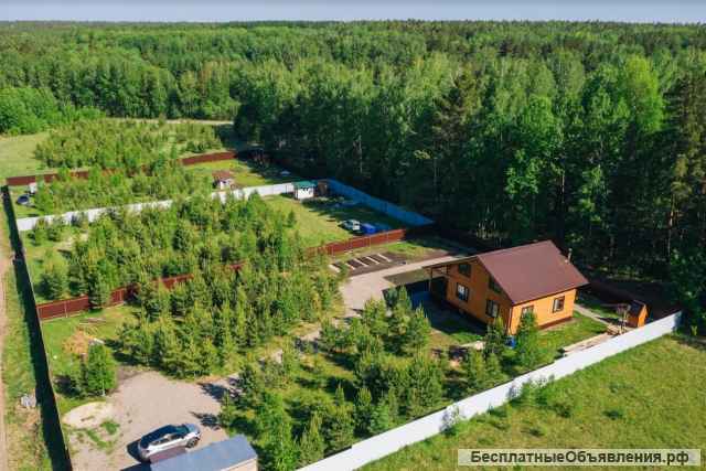 Земельный участок с озером и лесом