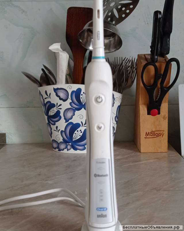 Электрическая зубная щётка