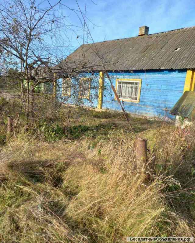 Участок с домом на берегу озера