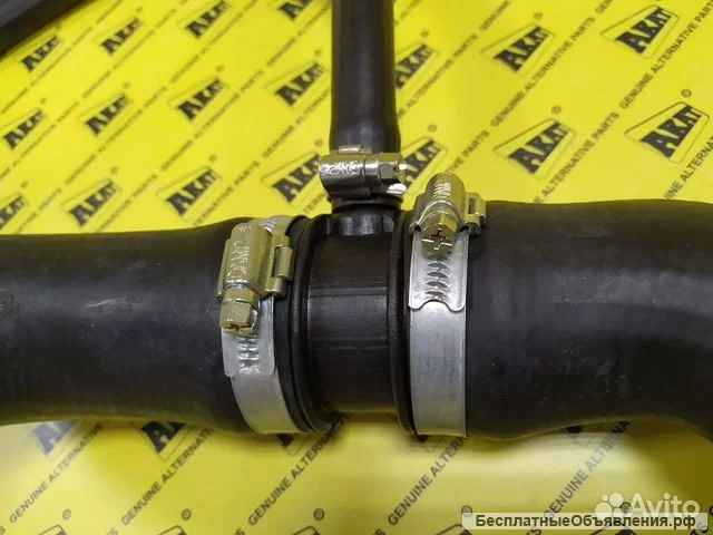 Патрубок радиатора верхний JCB 128/E0101