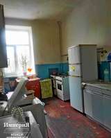 Комнату 31 метр с ремонтом и балконом в Центре