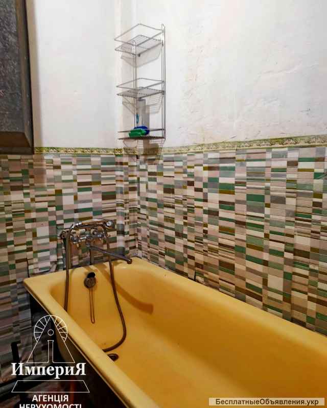 Комнату 31 метр с ремонтом и балконом в Центре