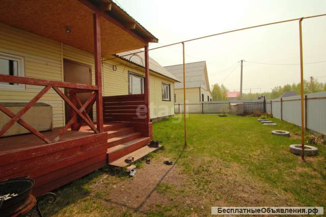 Деревянный дом в микрорайоне Новый