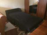 Мини диван-кровать в черном цвете