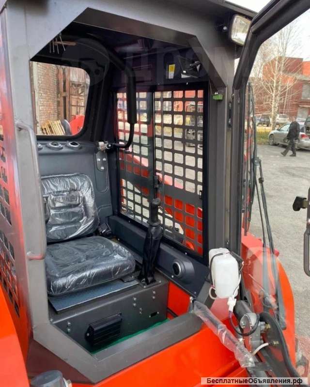 Колесный погрузчик с бортовым поворотом на рычагах QUADTRAC SSL 85