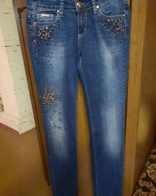 Фирменные брюки. Состояние отличное. Размер 46.