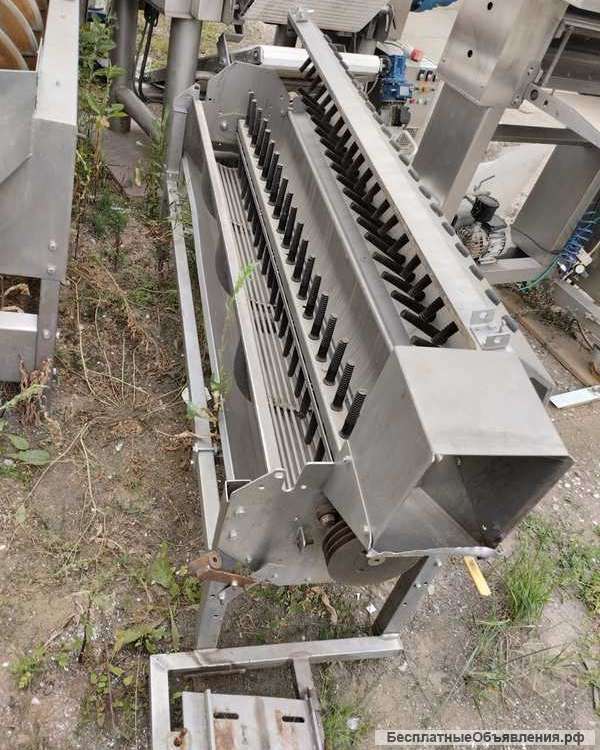 Машина Stork для очистки ног птицы