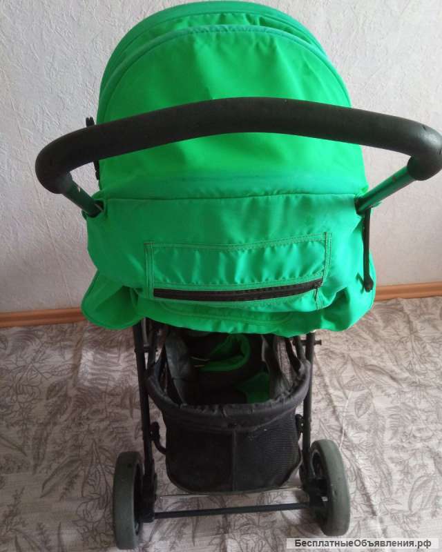 Прогулочную зеленую коляску
