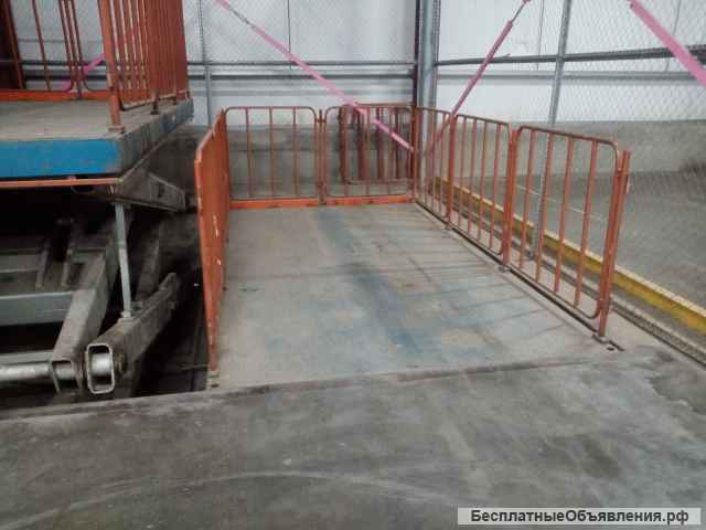 Подъемный вилочный стол