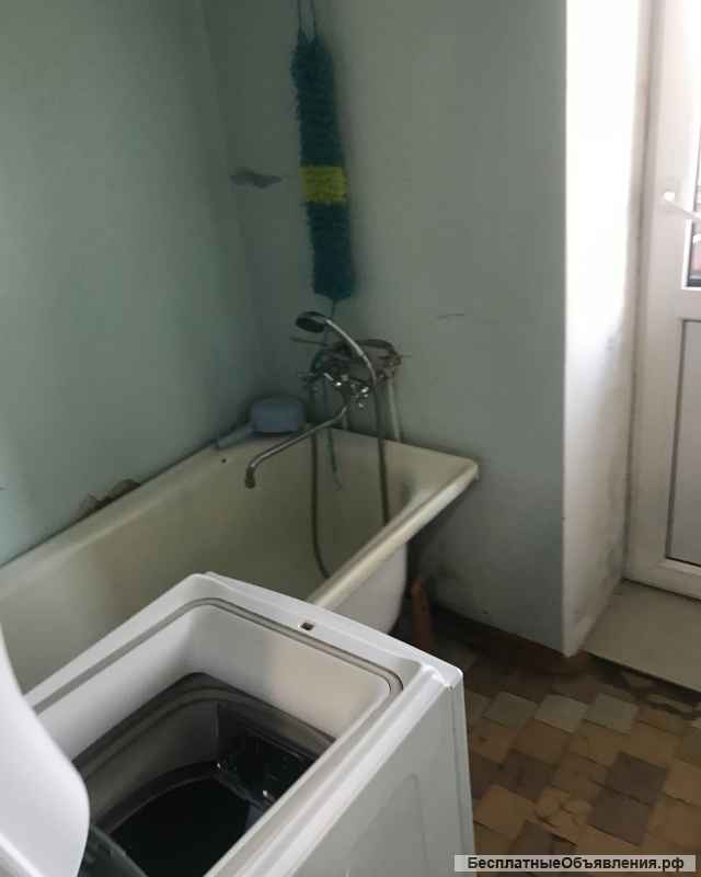 Комнату в 4-х комнатной квартире (общежитии)