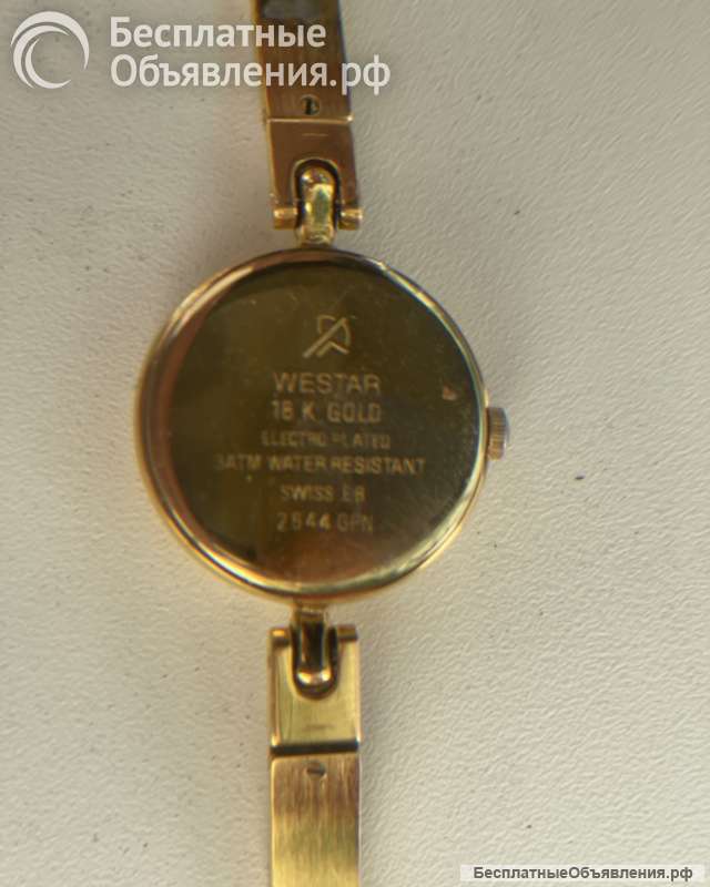 Наручные часы женские (позолоченные), кварцевые. Швейцария.