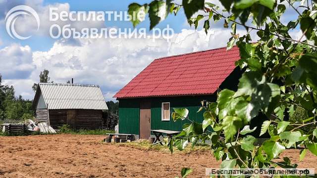Бревенчатый доми с баней на участке 15 соток в Печорском районе