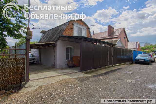 Двухэтажный дом с участком под огород