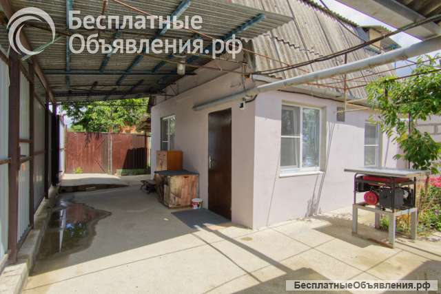 Двухэтажный дом с участком под огород