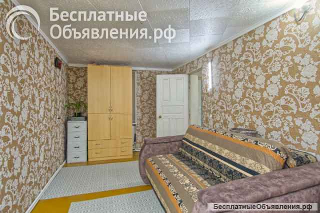 Двухэтажный дом с участком под огород