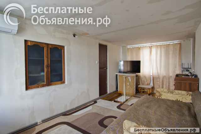 Двухэтажный дом с участком под огород