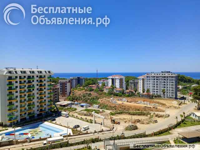 2-х соседних квартир 1+1 с видом на море в новом комплексе Konak Green Towers