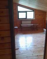 Двухэтажный коттедж из бруса недалеко от Минска