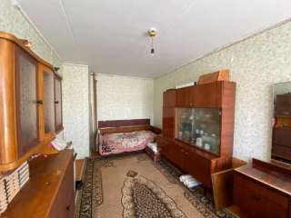 Трёхкомнатную квартиру в городе Кизел