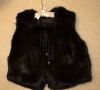 Черная меховая жилетка из кролика