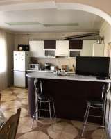 Жилой дом со встроенным магазином