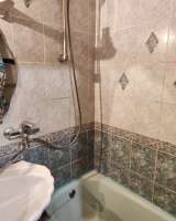 Четырёхкомнатную квартиру в Заельцовском районе